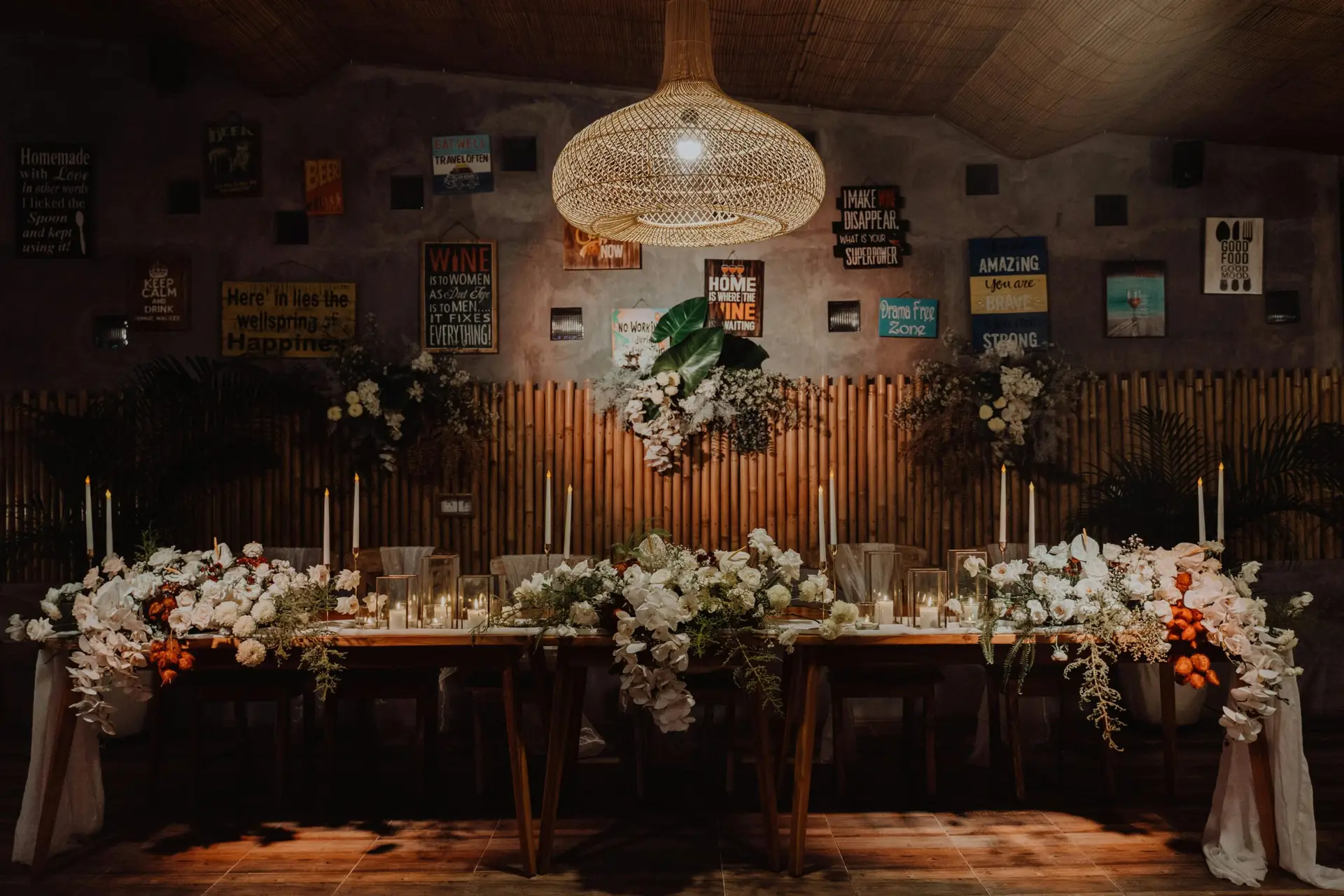 Charming indoor wedding setup featuring floral arrangements and candlelight.
